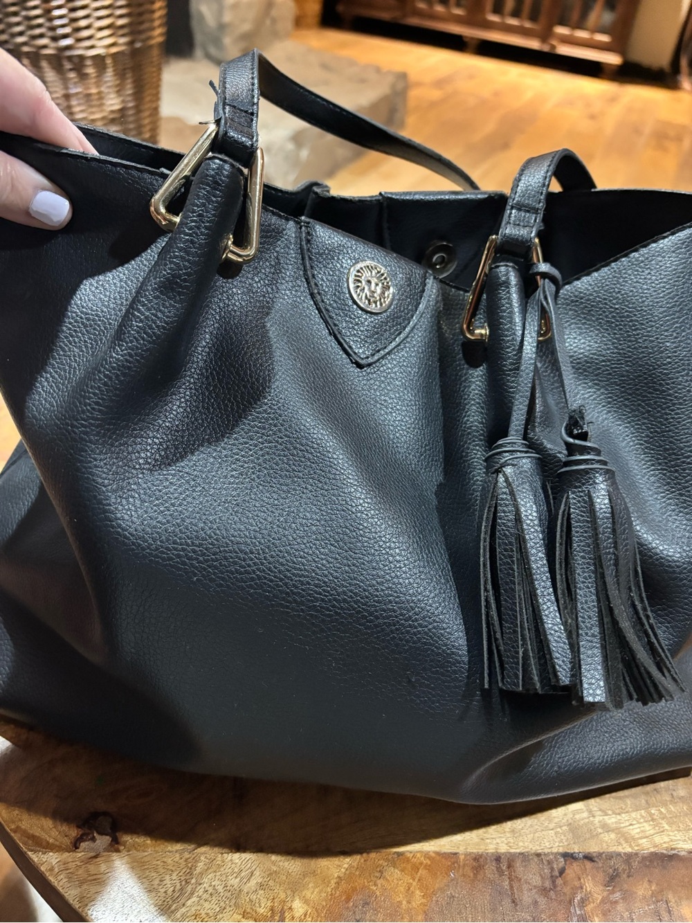 Anne Klein Black Leather Tassel Tote with Gold Accents
